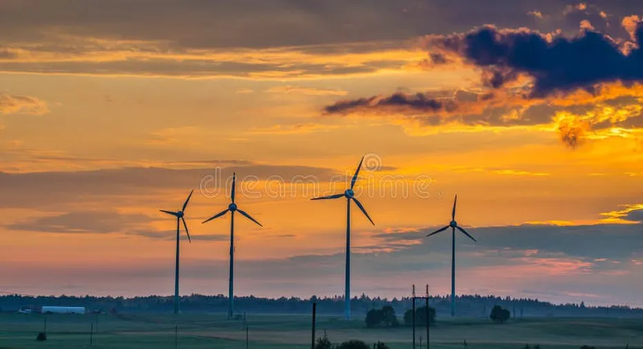 Wind turbines sunset landscape